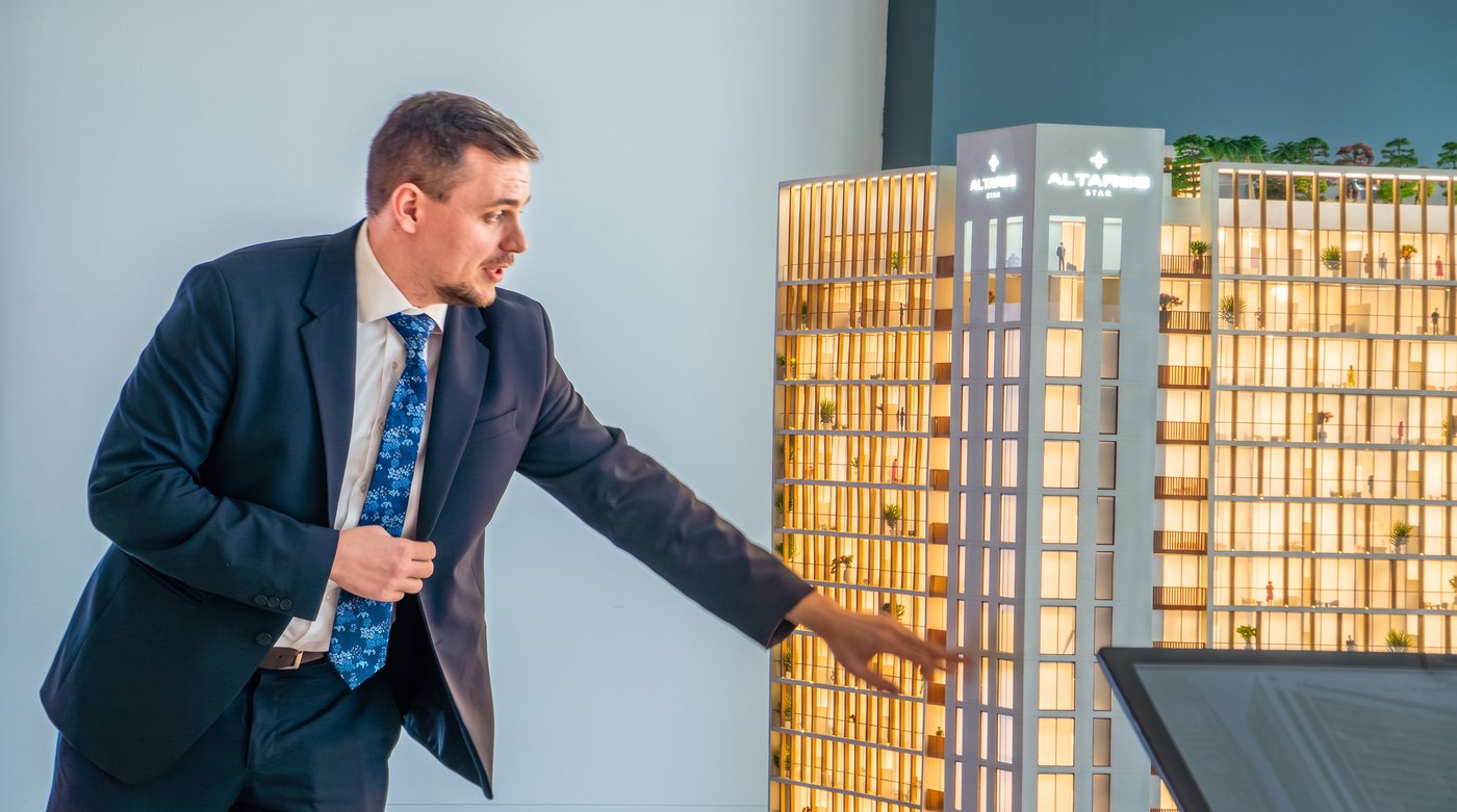 A Monarch Hill consultant presenting the Norah Residence model